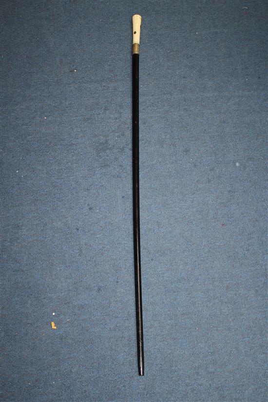 A late Victorian ebonised walking cane, 36in.